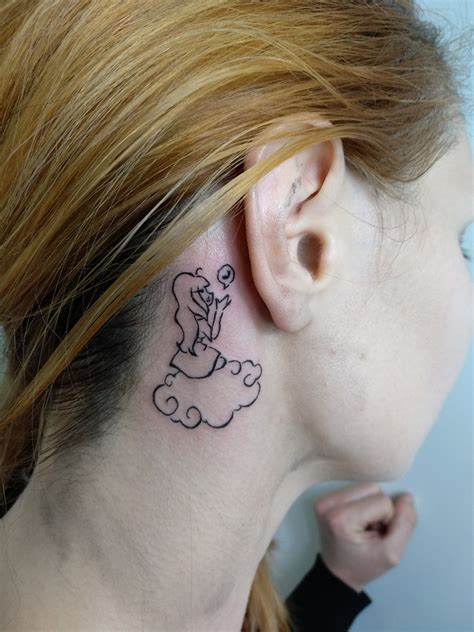 angel whispering in ear neck tattoo|Angel Whispering In Ear Tattoo Meaning: A。